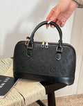 Embossed Monogram Dome Handbag